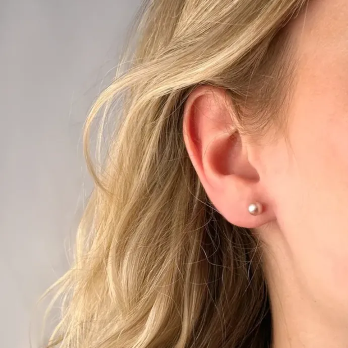 5,5 mm rosa perleøreringe i 9 karat guld
