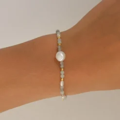 Blå armbånd i forgyldt sølv
