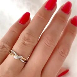 Diamantring i 14 karat guld.- og hvidguld 0,03 ct