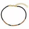 Elegant armbånd med onyks og granat og hematite.