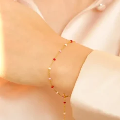 Enamel Lola Rosie armbånd i forgyldt sølv farvet emalje