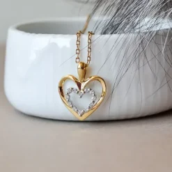 Hjerte diamant vedhæng i 14 karat guld.- og hvidguld 0,18 ct