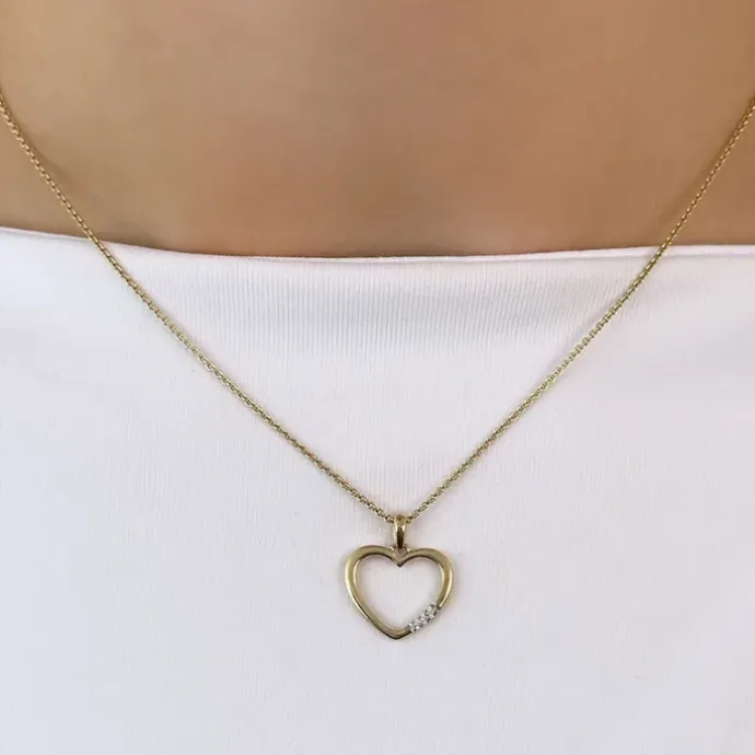 Hjerte diamantvedhæng i 14 karat guld.- og hvidguld 0,015 ct