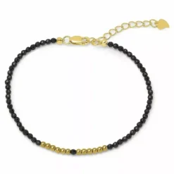 Mørkeblå metallic armbånd med sten og hematite.