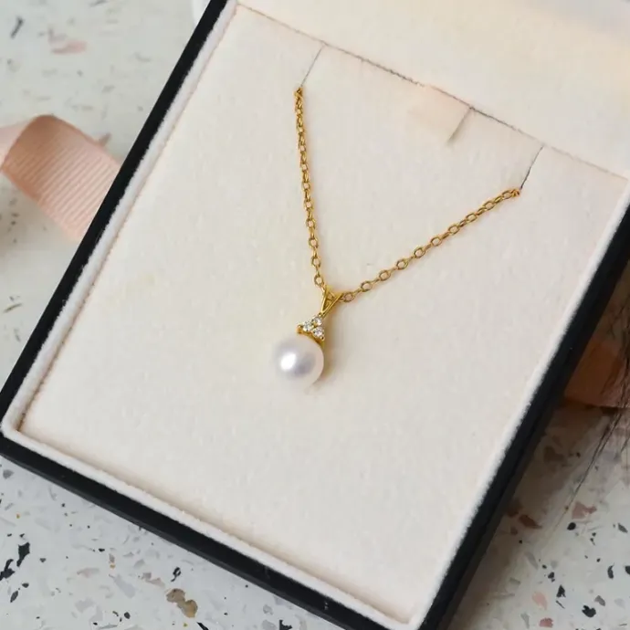 Perle vedhæng i 14 karat guld 0,05 ct