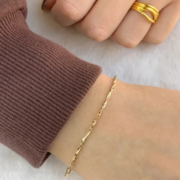 Snoet armbånd i forgyldt sølv 1,3 mm